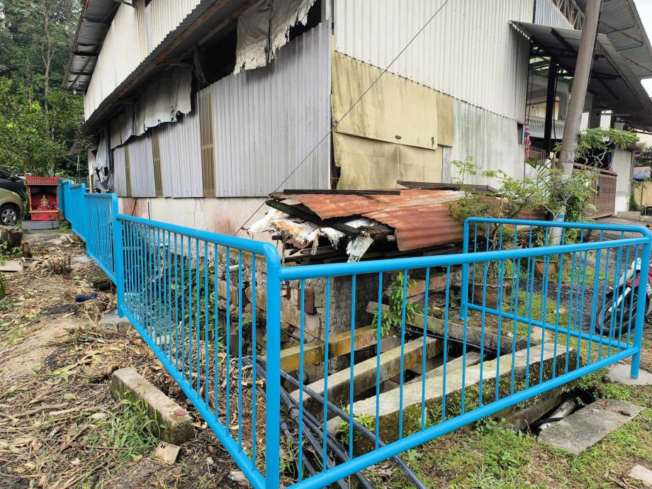 大都会/黎丁财 甲洞乌鲁新村1A路围栏竣工