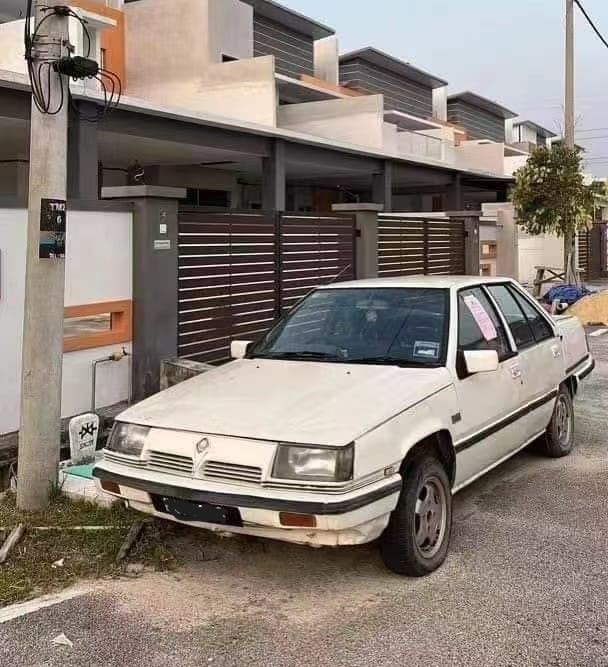 柔:新闻:车停家门前被麻市会开罚? 议员:阻交通接警告信