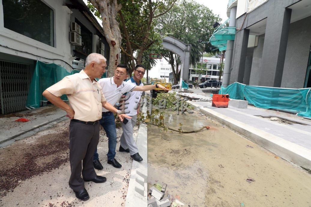 柔：新闻：遭暴雨袭击后已善后  陈旭年街恢复热闹