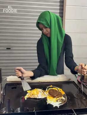 视频|残疾女自力更生卖汉堡 网民力赞:太棒!