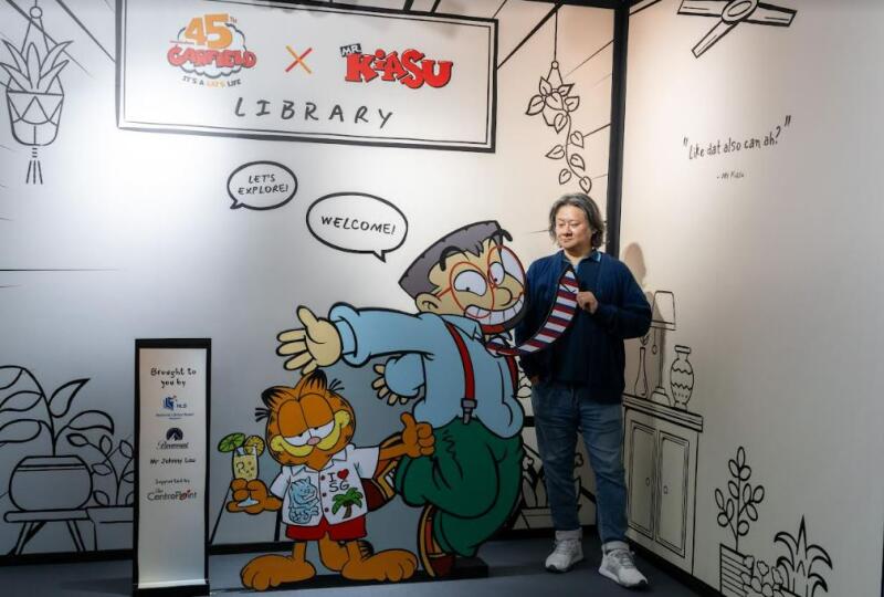 (已签发)柔:狮城二三事:怕输先生与加菲猫 狮城“合开”快闪图书馆