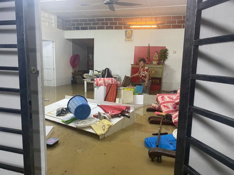 me02主文-大都会/潘佩玲 甲洞乌鲁新村淹水PC/8图