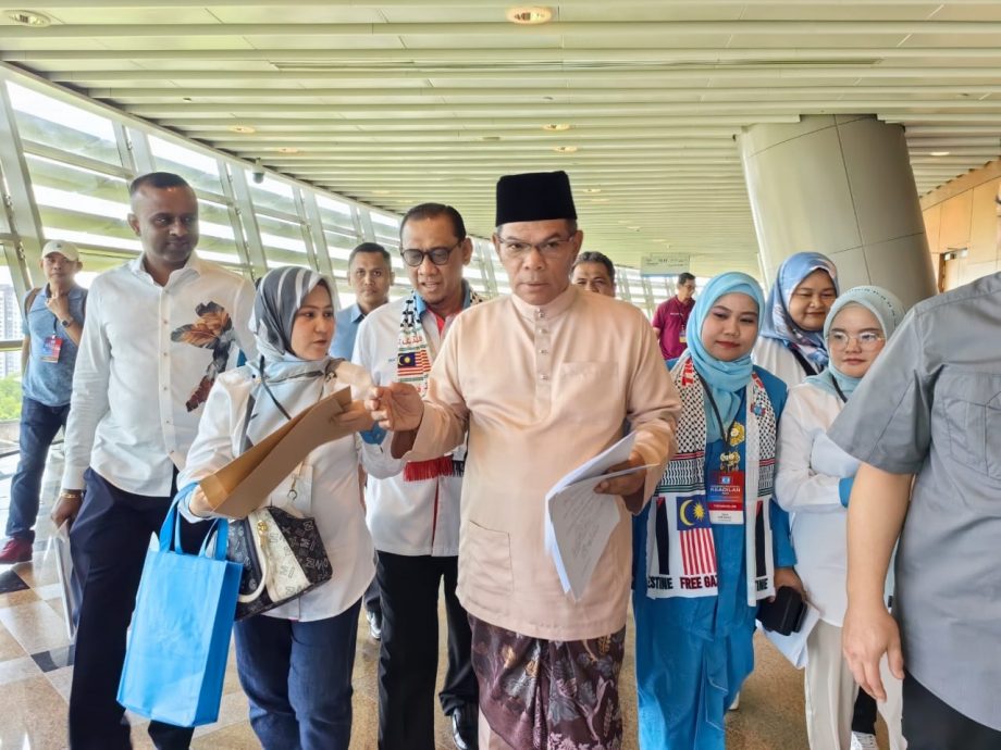 “取走被举报书刊是正常程序” 内长：没共产主义就归还书店