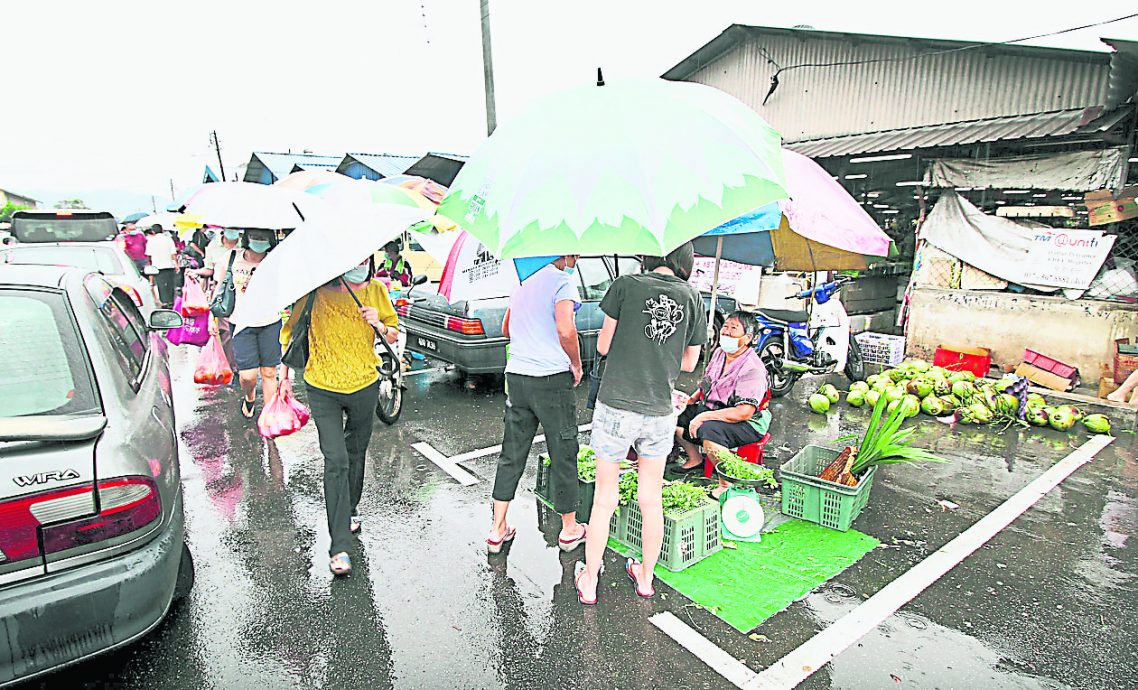 大都会/封面/PayungLah共享雨伞计划