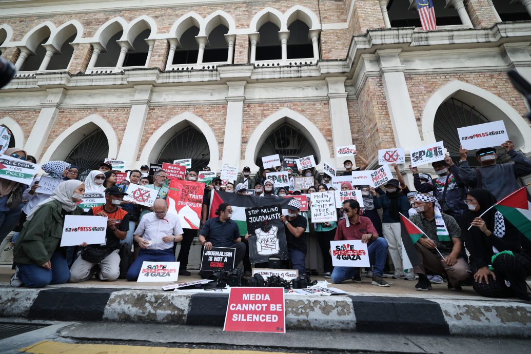 我国新闻从业员声援加沙媒体