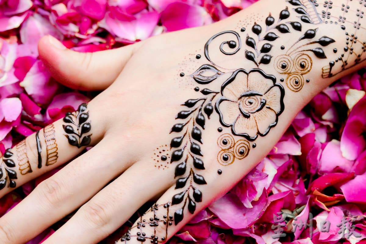 柔:【特稿】: 屠妖节 战胜黑暗迎光明 彩绘 姆鲁古 拉近各族联系