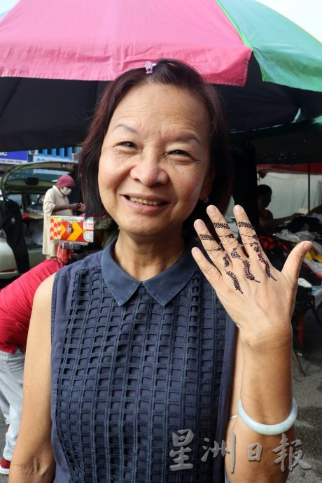 柔:【特稿】: 屠妖节 战胜黑暗迎光明 彩绘 姆鲁古 拉近各族联系