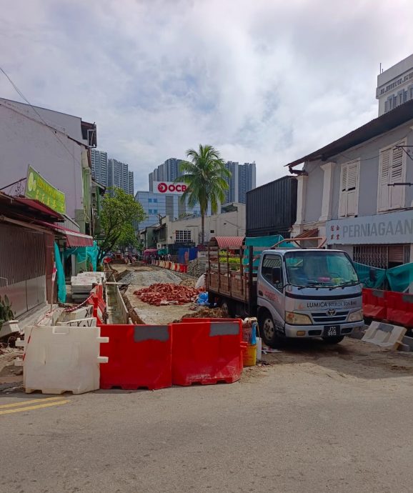 **己签发**柔:第二版头条:【特稿】:阶段美化工程完工,陈旭年街呈新气象