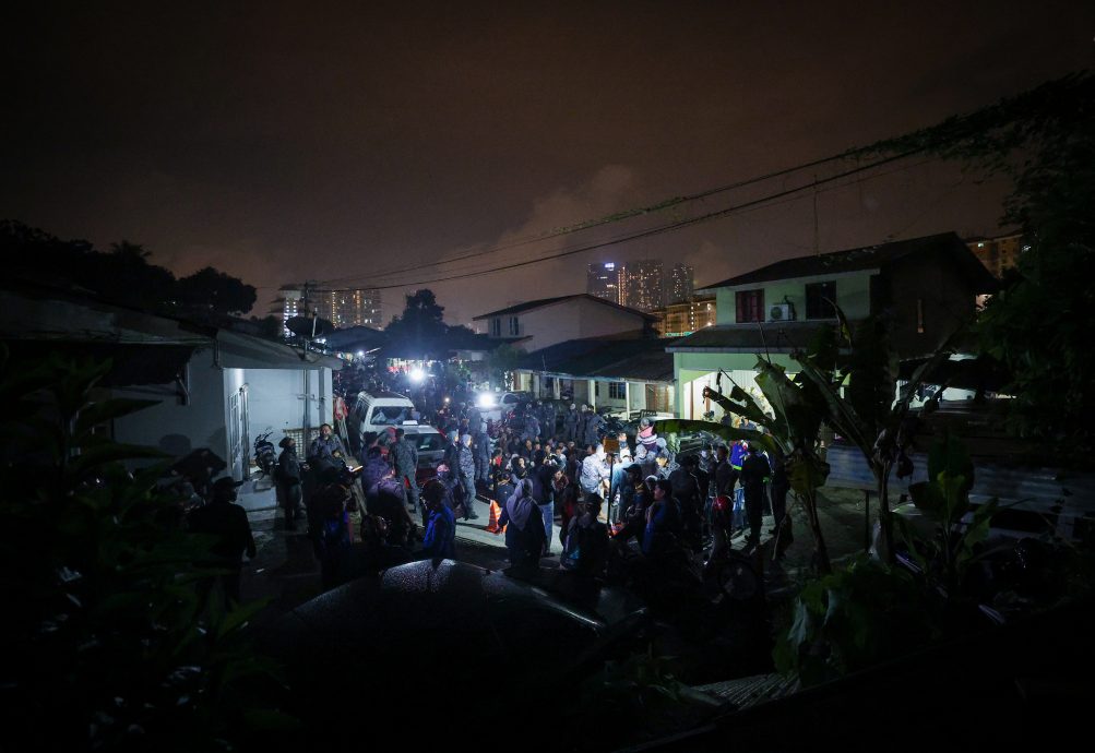 移民局突击隆市非法木屋区·逮捕69非法外劳包括2岁男童