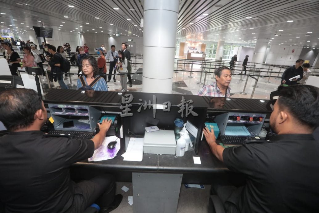 视频|内长:入境人流高峰期 KLIA全开60柜台