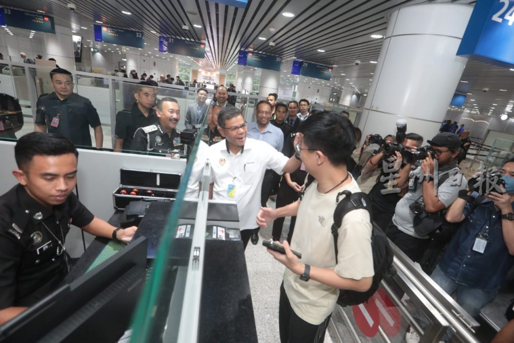 视频|内长:入境人流高峰期 KLIA全开60柜台