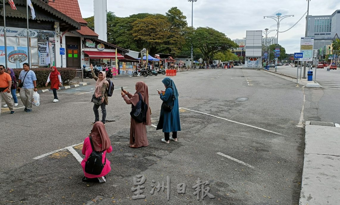 （古城封面主文）无车区54小时·三宝井海乾街生意跌