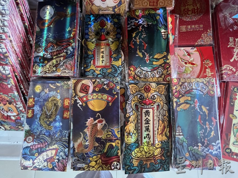 贺卡式微依然有需求 龙年红包封深受喜爱