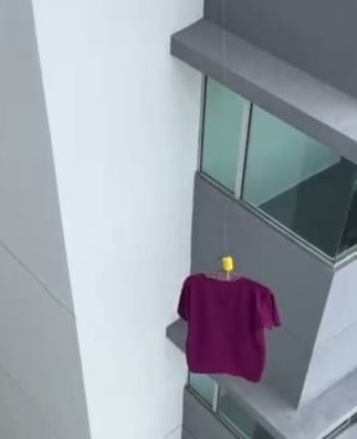 钓竿不钓鱼钓衣服 高楼居民妙招获网赞