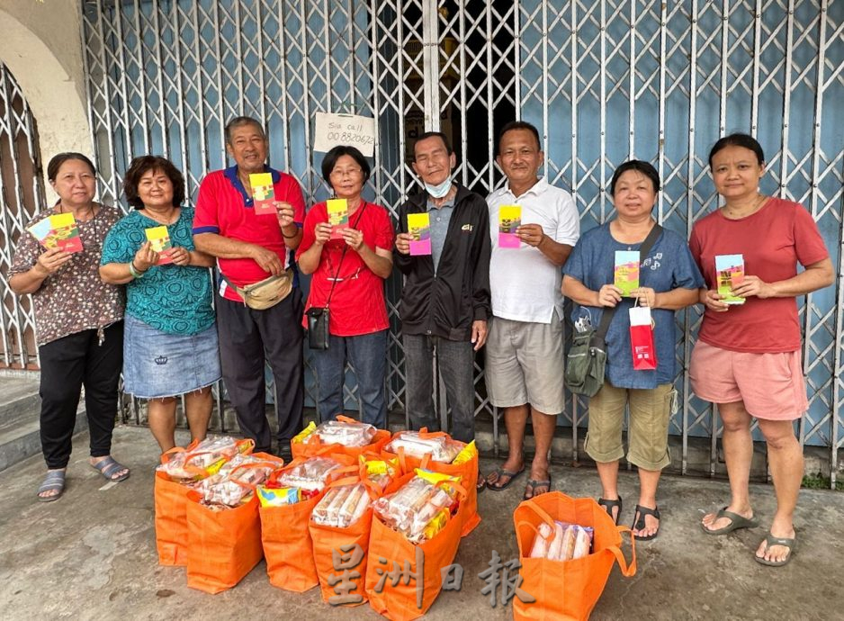 (古城第七版主文)65人领取红包爱心餐过年 感受社会温情
