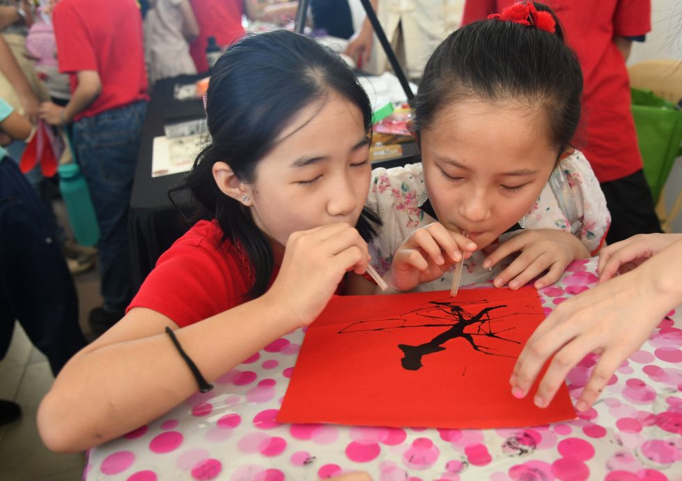 （版头）大都会-深静（哈古乐）华小新春活动