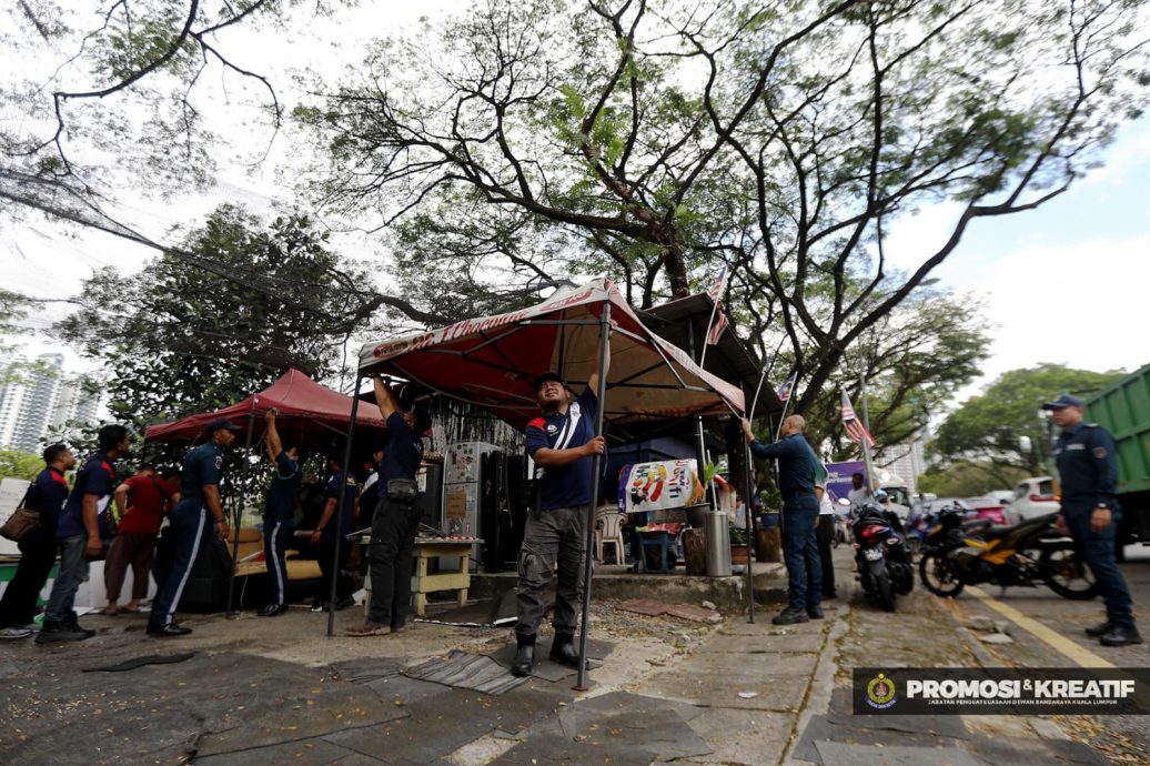 大都会/市政局情人节突击取缔非法洗车中心和熟食摊