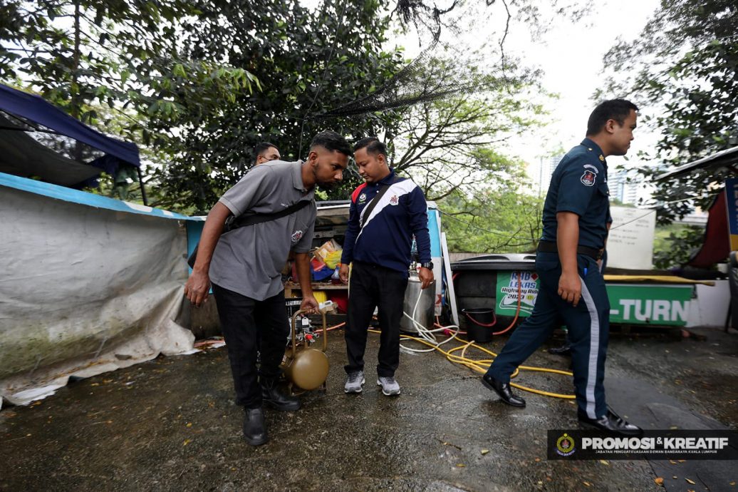 大都会/市政局情人节突击取缔非法洗车中心和熟食摊
