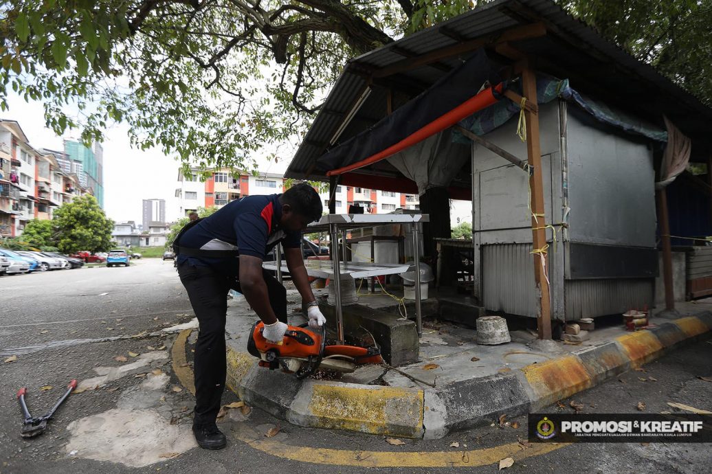大都会/市政局情人节突击取缔非法洗车中心和熟食摊