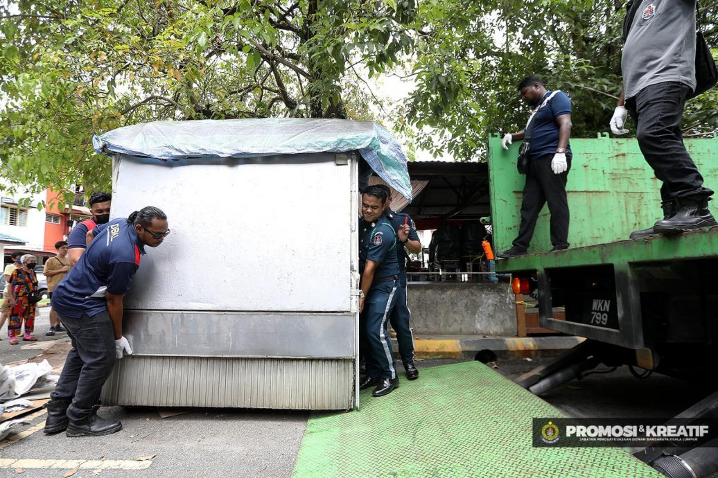 大都会/市政局情人节突击取缔非法洗车中心和熟食摊
