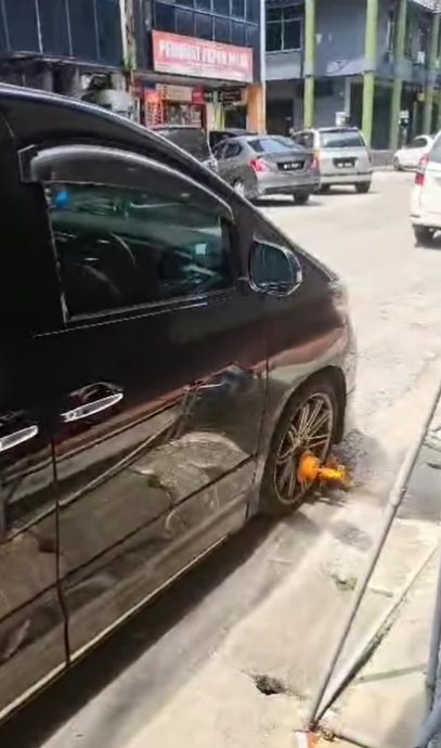 女艺人车停路边5分钟被锁轮 “为何快递车没事?执法不公!”