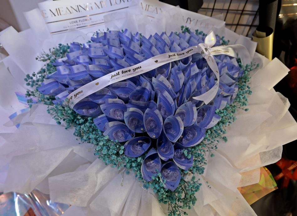 封面-大都会/情人节花市慢热 玫瑰花涨幅最高 近30%/多图(选下)