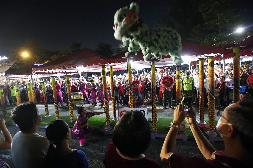 版头-大都会/莲花苑元宵节抛柑活动/15图(选下)