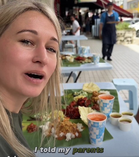 视频|初次访马要入乡随俗 洋女教父母用手抓饭吃