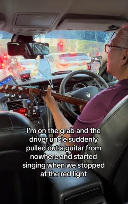 视频|担心记忆退化不会弹吉他 老司机停红灯弹唱《上海滩》