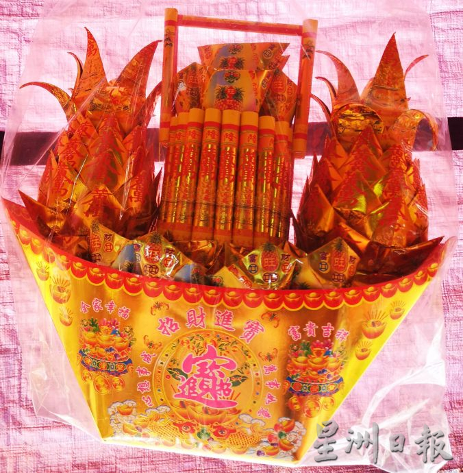 (古城第三版主文)新年神料市场慢热 香略涨价金银纸则降价