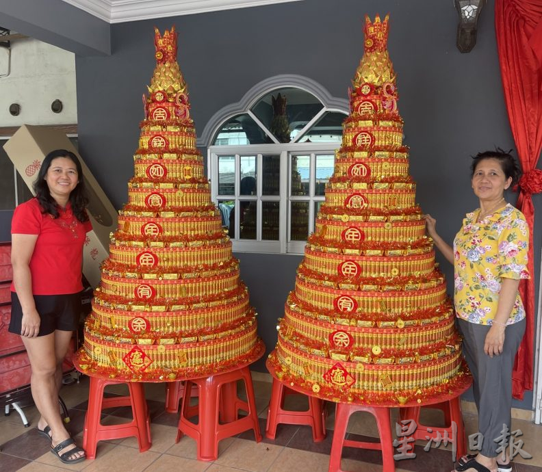 (大北马)2妇女无师自通,制作逾7尺的“旺梨金塔”给顾客