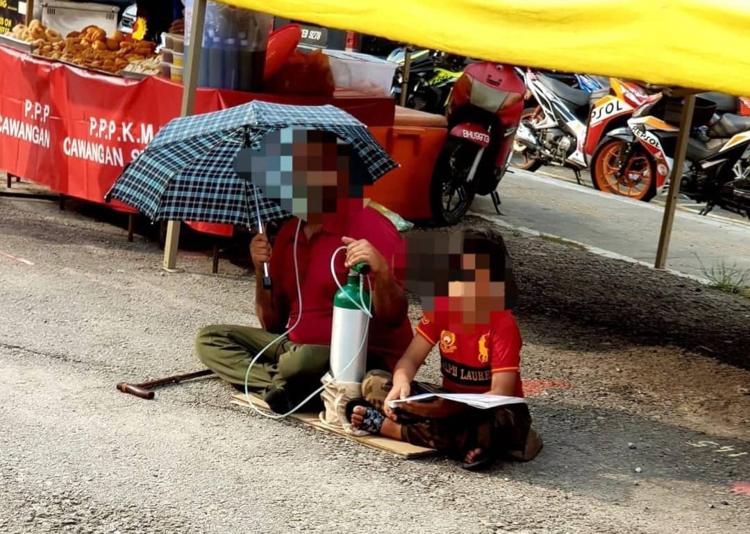 罗兴亚人偕童戴氧气面罩乞讨 网民轰:移民局请行动!