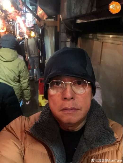 谭咏麟蜜游日本 与神秘女十指紧扣被撞正