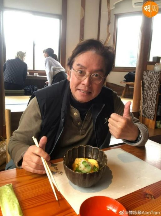 谭咏麟蜜游日本 与神秘女十指紧扣被撞正