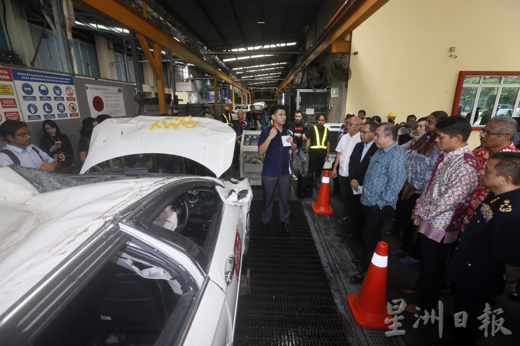 陆兆福巡视汽车报废中心及线上汽车报废系统