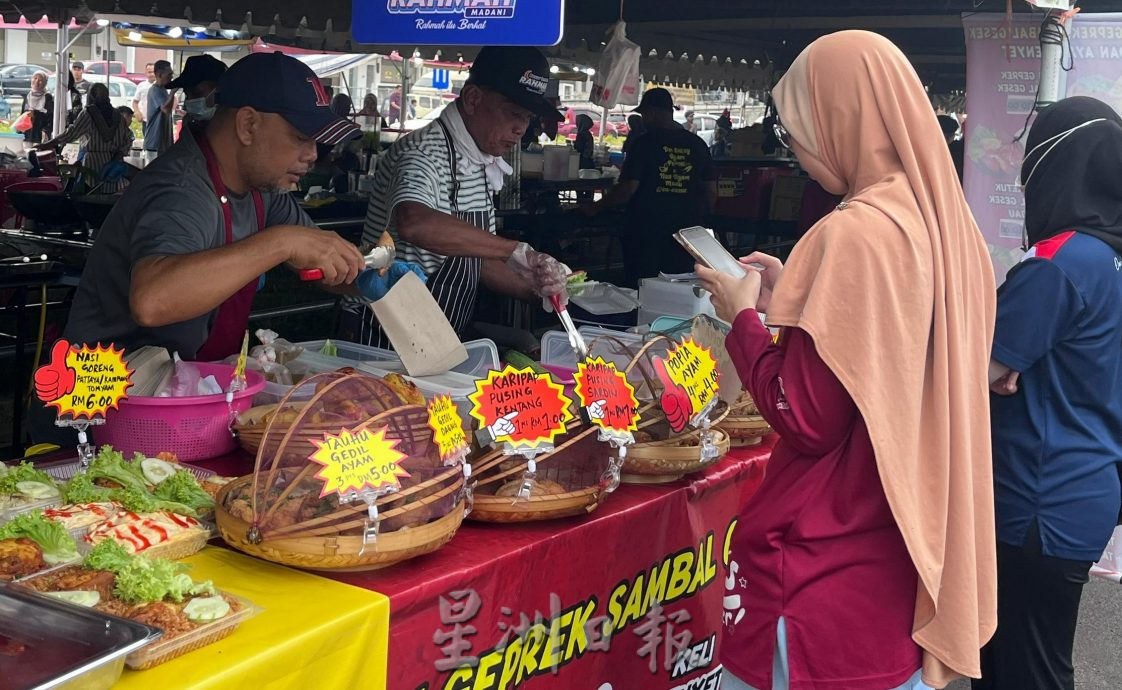 (古城第二版主文)谢守钦:鼓励加入零售数字化倡议,实现无现金交易