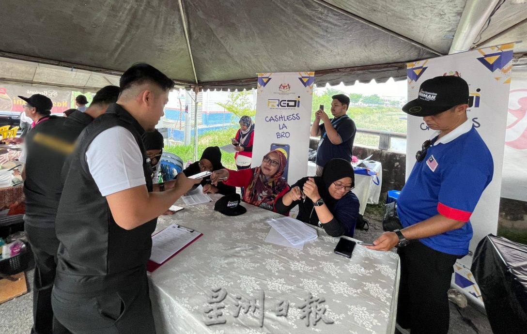 (古城第二版主文)谢守钦:鼓励加入零售数字化倡议,实现无现金交易