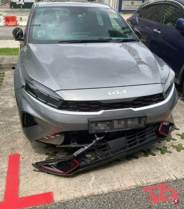 (已签发)柔:狮城二三事:停组屋楼下10分钟 爱车被撞男子报警