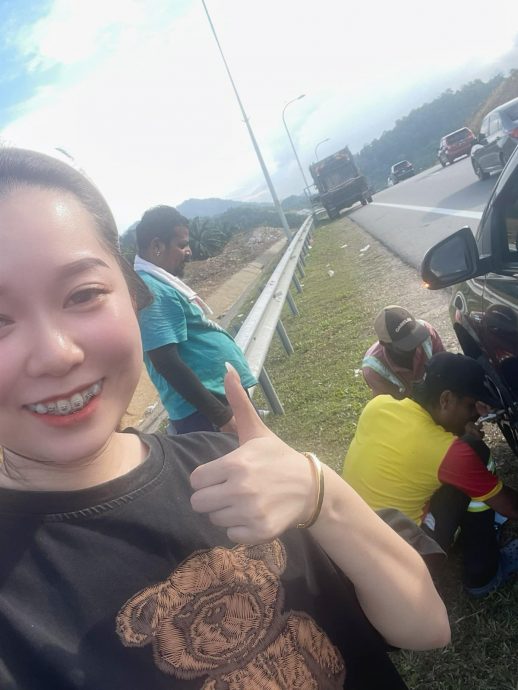 三清洁工人暴晒帮女子换轮胎 网民:和谐有爱社会