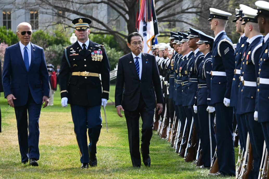 宣布70国防合作协议  拜登岸田加强美日联盟