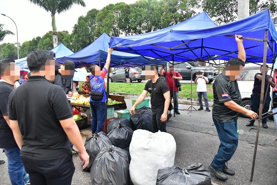 *已签发*柔:新山市政厅等单位取缔非法外籍小贩