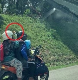 穷人悲歌!他人租Vellfire回乡过年 这一家三口却摩托共乘120km