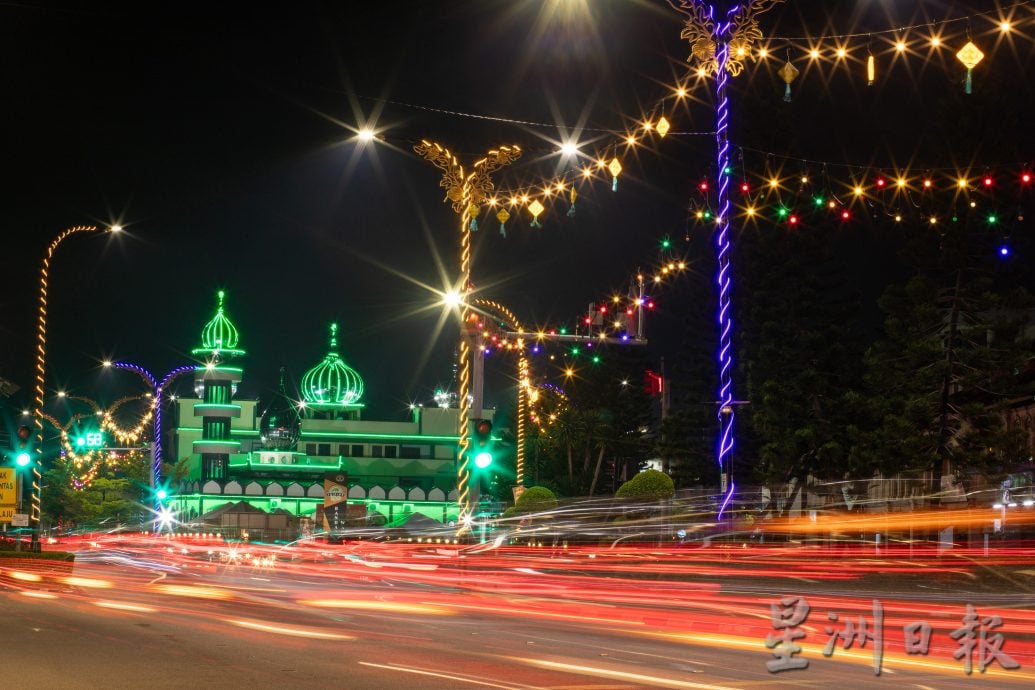 赶在开斋节前夕竣工亮灯  甘文丁新村地标温馨登场