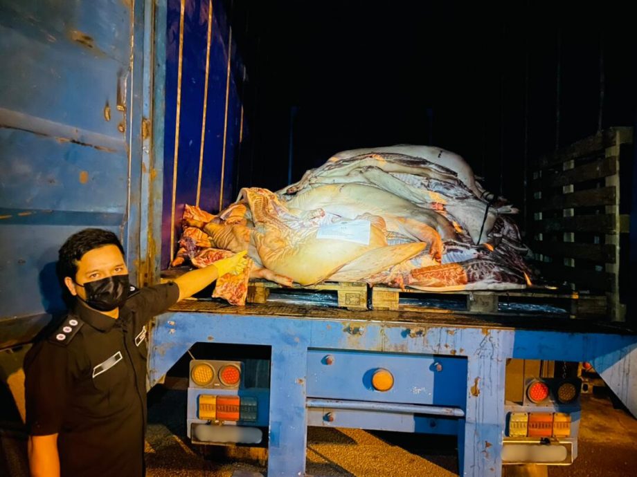 (已签发)柔:大马检疫及检验局 扣查无进口准证猪肉