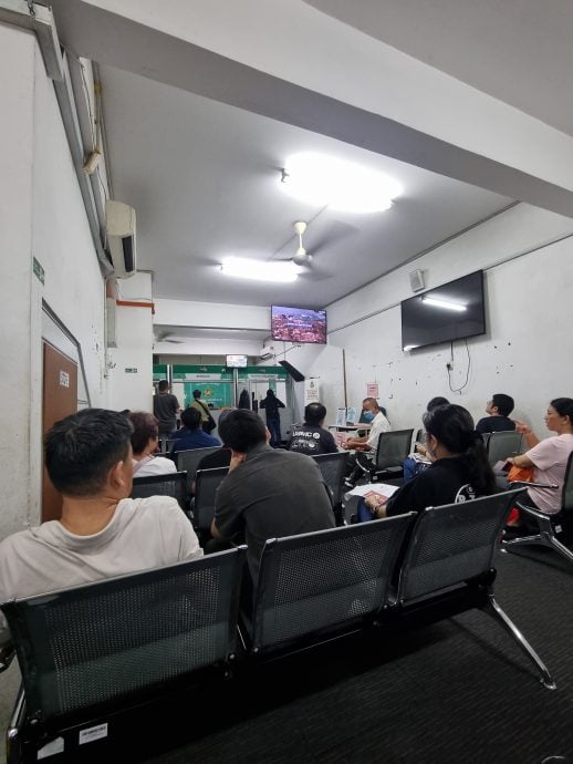 大都会封面/跟进蒲种移民局人潮/11图