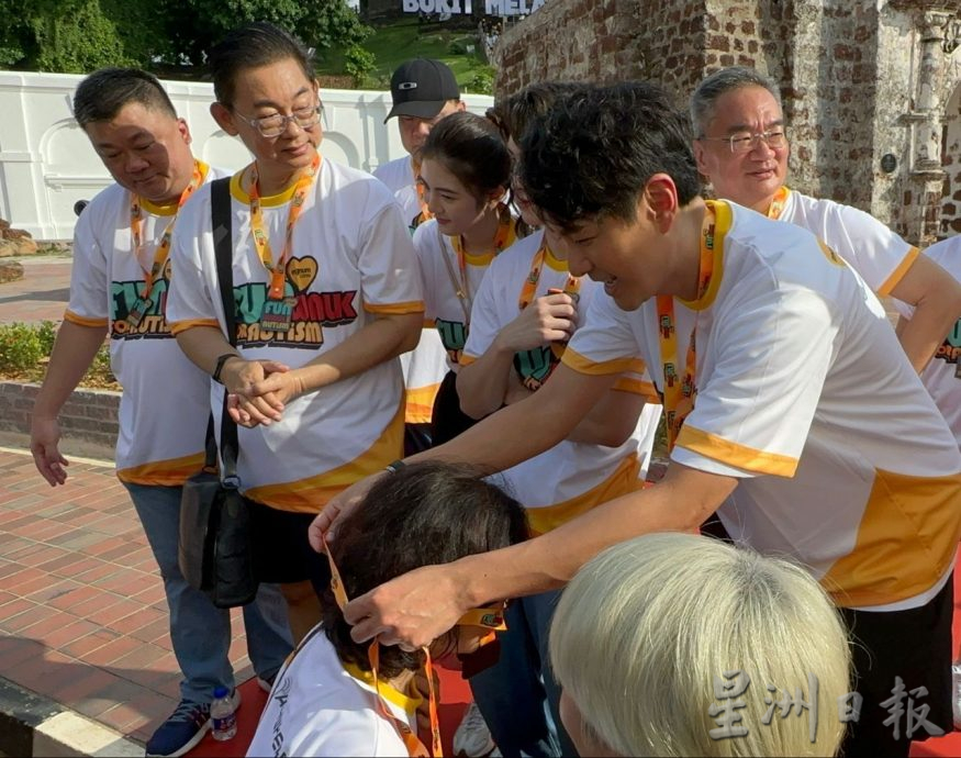 (古城第三版主文)萧正楠参与古城义行