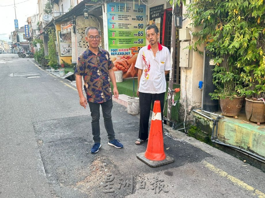 (古城第五版主文)荷兰街车流量高路洞一补再补 刘志俍促重铺道路