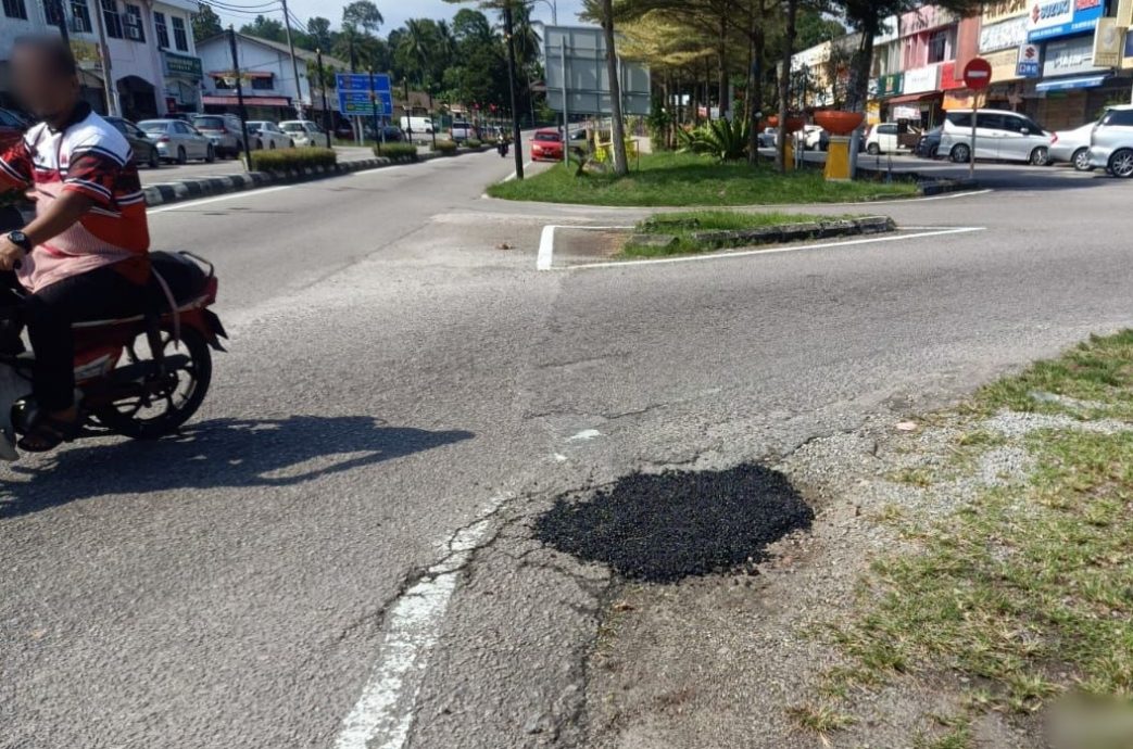 (古城第六版主文)修复路洞消除安全隐患