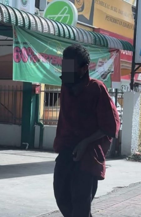 (大北马)女司机开车等交通灯,遭男子抛砖砸车尾