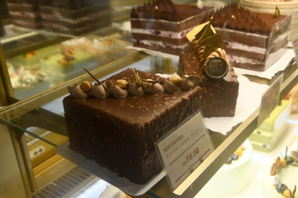 大都会/封面/可可粉涨价 民众或会吃“贵巧克力蛋糕”